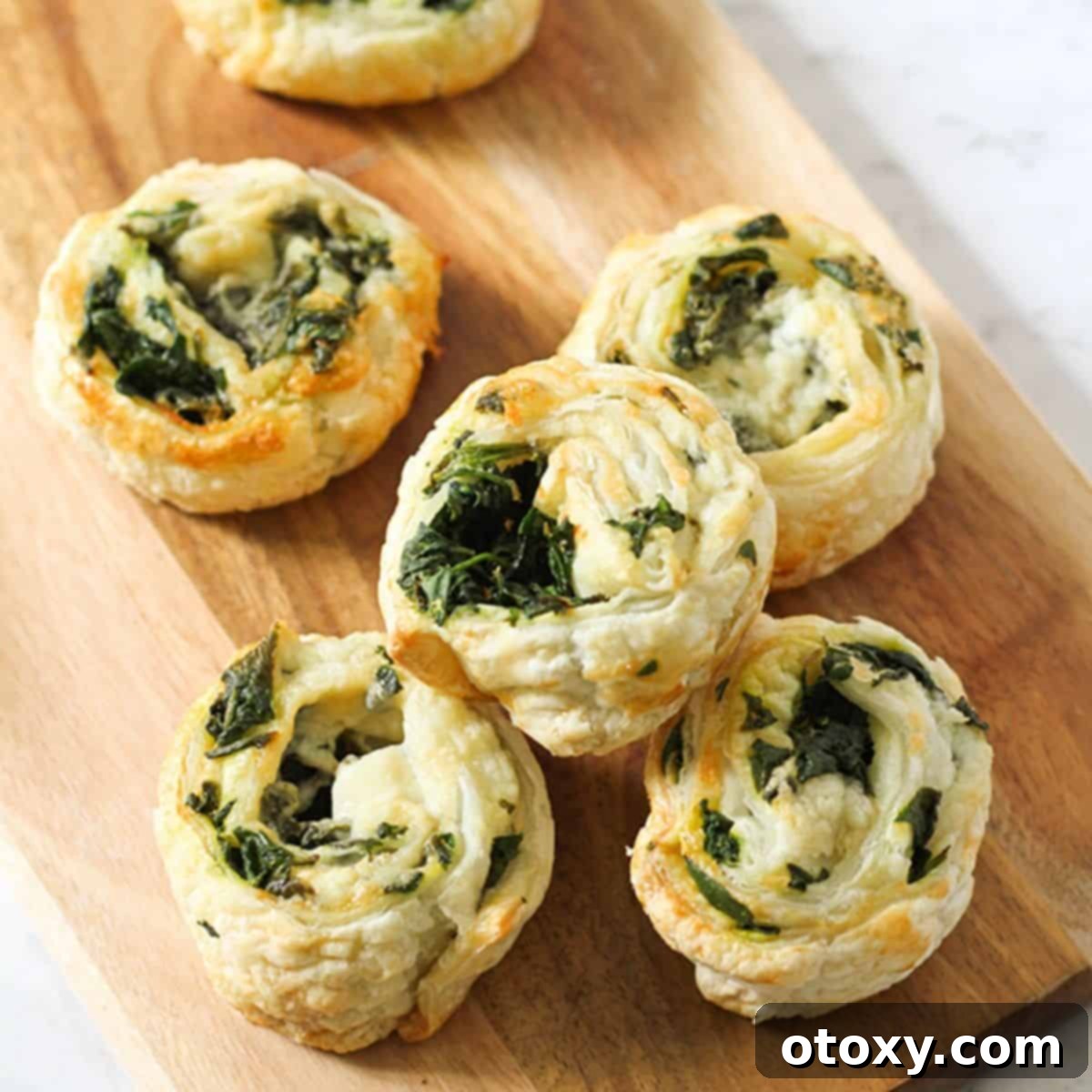 Spinach Feta Pinwheels Ready for Oven or Air Fryer 1 featured 5037
