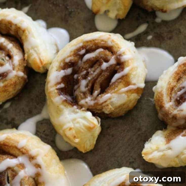 20 Effortless Puff Pastry Delights 16 Fluffy Puff Pastry Cinnamon Rolls with a sweet vanilla glaze.
