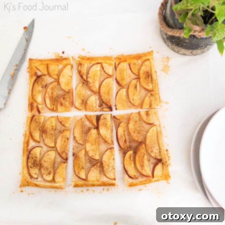20 Effortless Puff Pastry Delights 9 A rustic Puff Pastry Apple Tart with thinly sliced apples arranged beautifully on a flaky crust.