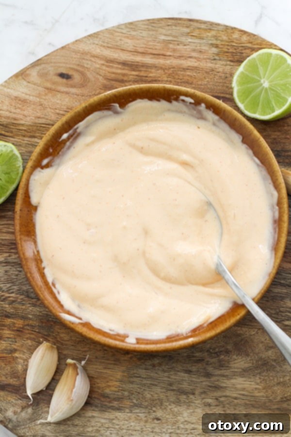 sriracha aioli in a brown bowl.