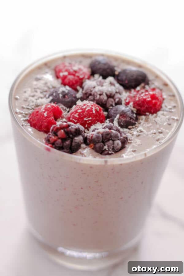 Tropical Burst Smoothie 4 Mixed fruit smoothie in a glass