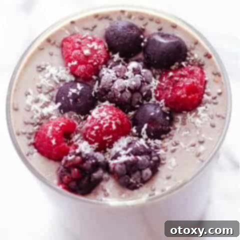 Tropical Burst Smoothie 6 close up of berry green smoothie in small glass