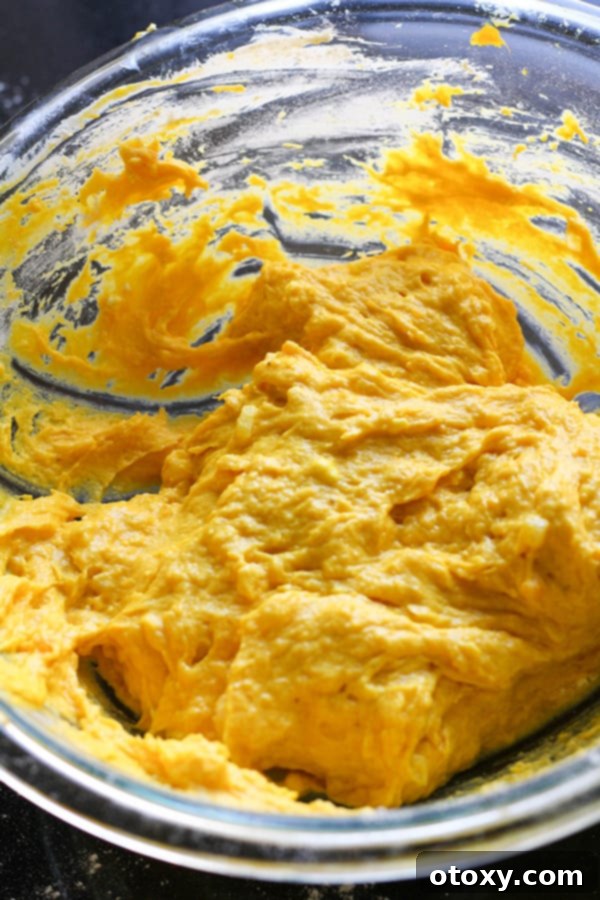 Golden Pumpkin Bites 8 mashed pumpkin in a glass bowl.