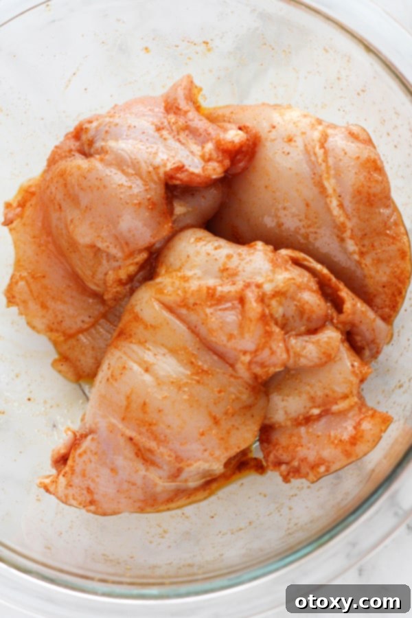Ultimate Air Fryer Chicken Thighs 5 marinate the chicken