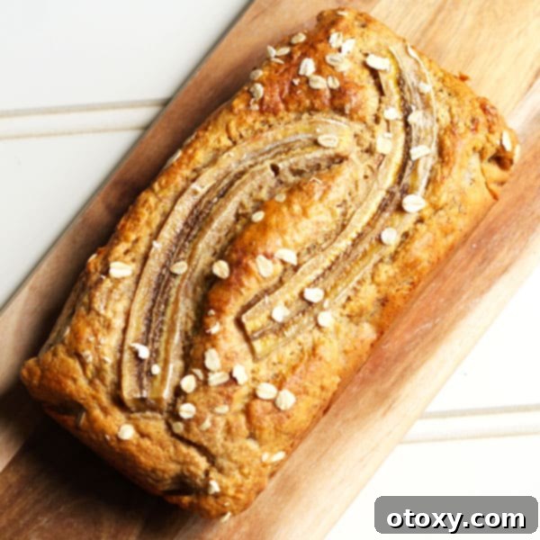 healthy banana bread loaf, golden brown and inviting