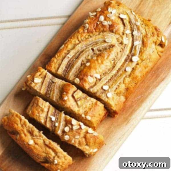 Two slices of healthy banana bread on a wooden board