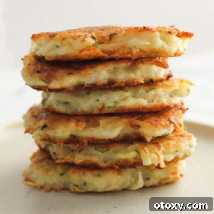 Stack of crispy potato fritters, ready to be enjoyed.