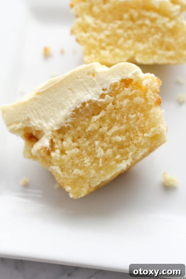 white chocolate cupcake cut in half.