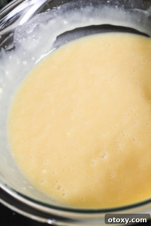 cupcake mixture in a glass bowl.
