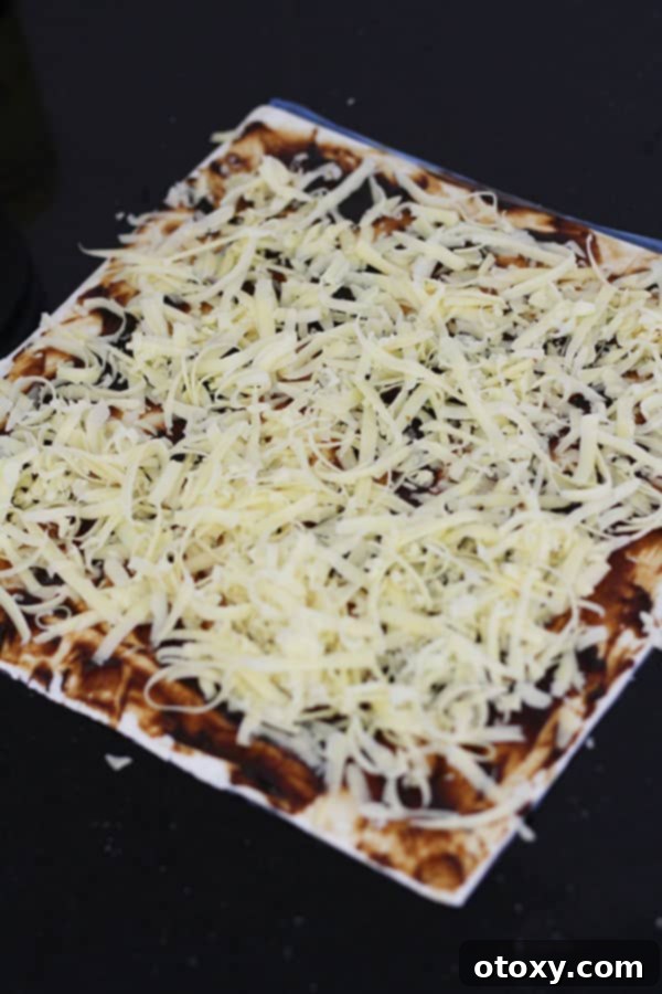 Easy Vegemite and Cheese Pinwheels Baked or Air Fried 5 A sheet of puff pastry covered with a layer of Vegemite and generously sprinkled with grated cheese.