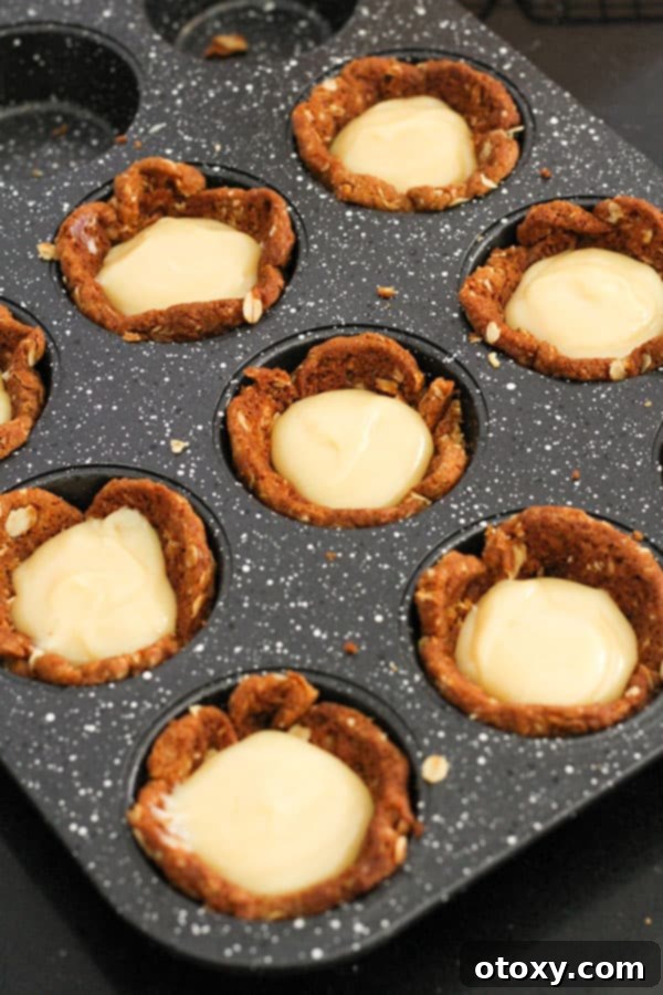 Luscious Caramel Tartlets 7 caramel filled tart cases in a muffin tray.