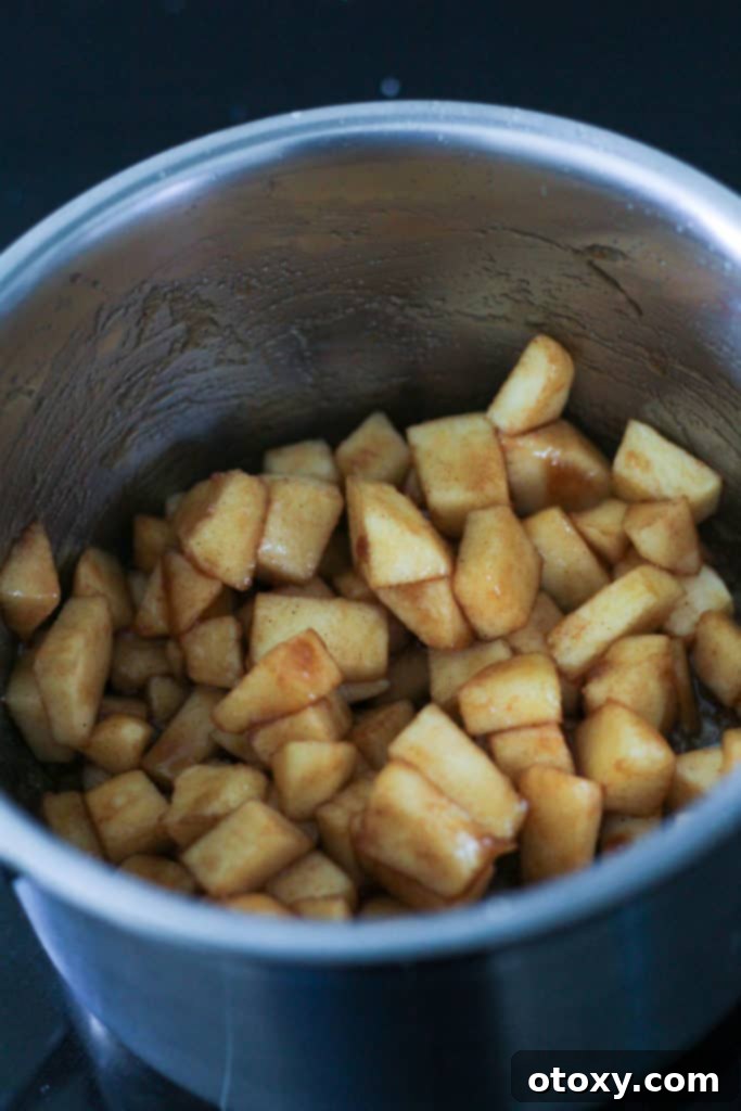diced apples in a saucepan.