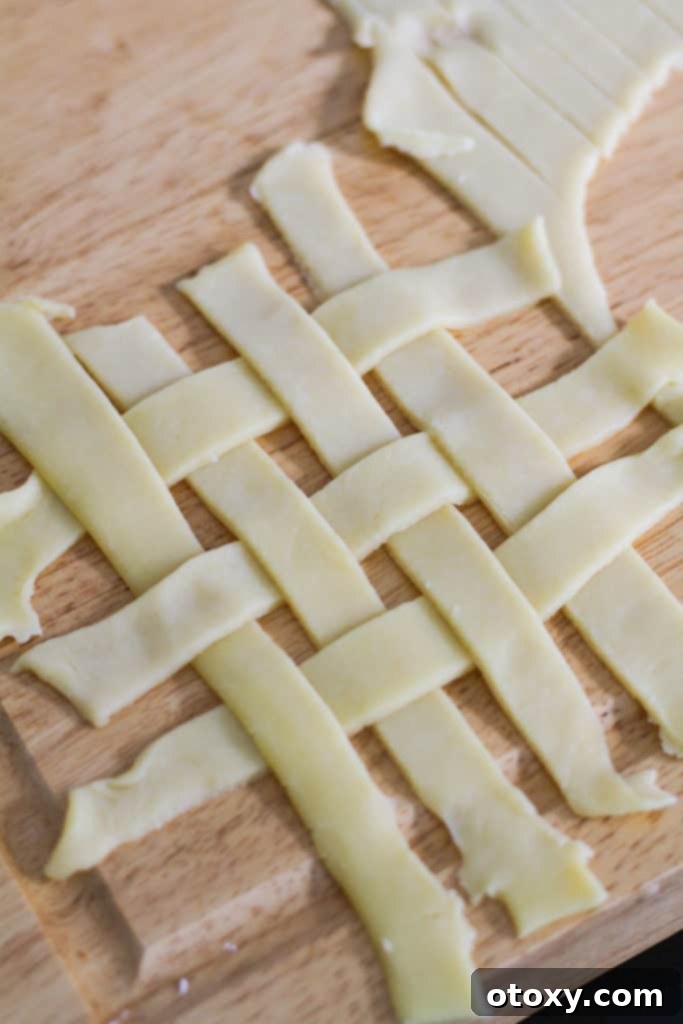 shortcrust pastry cut out in a lattice pattern.