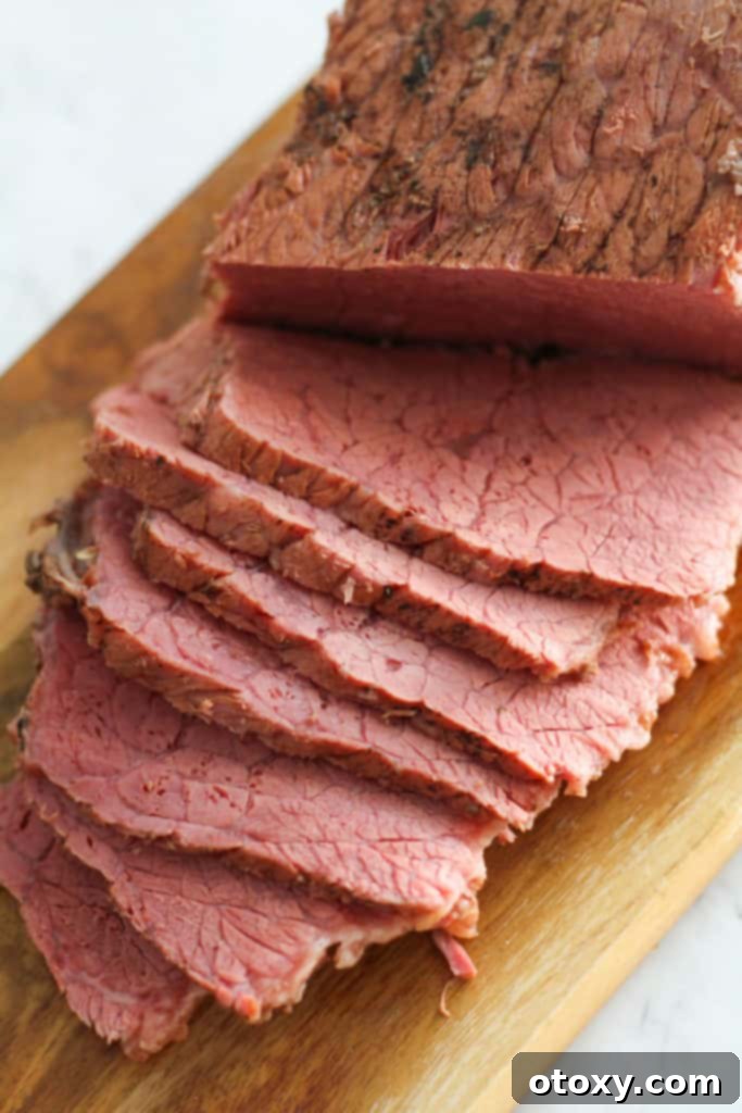 slices of the meat on the wooden serving tray