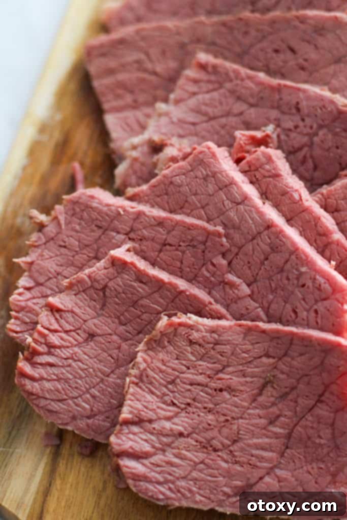 slices of corned beef on a plate.