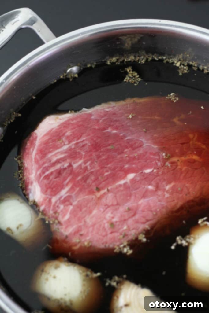 the meat in a saucepan filled with water