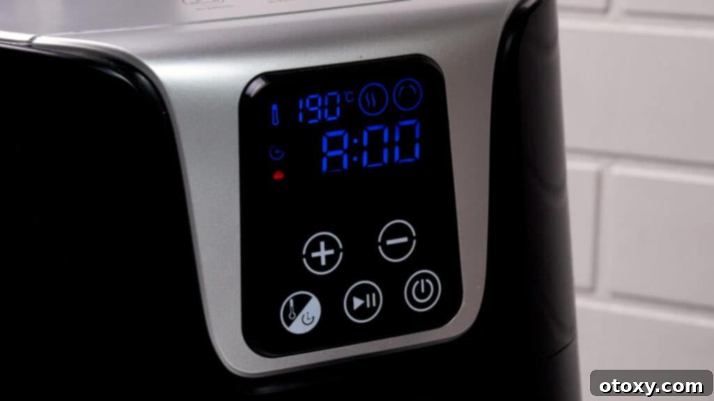 Air fryer "KCB" control panel showing 375°F (190°C) temperature and 8-10 minute timer