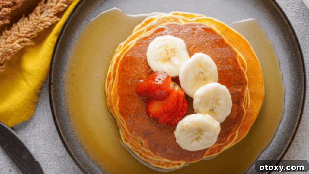 Ultimate 40g Protein Pancakes 3 Protein Pancakes with toppings on the plate