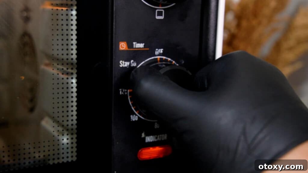 Analog oven set to 350 F degrees