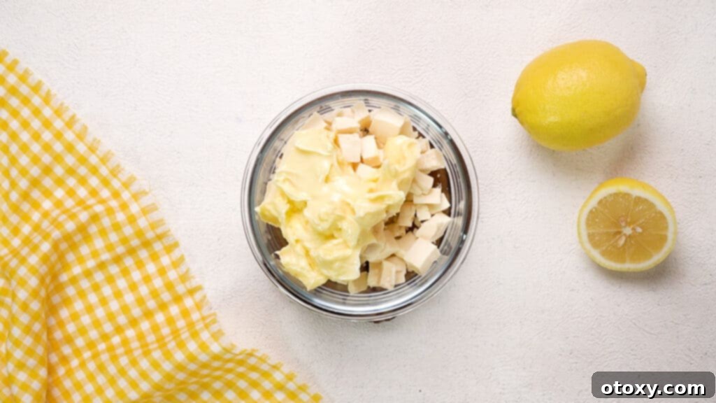 Butter and white chocolate in small bowl