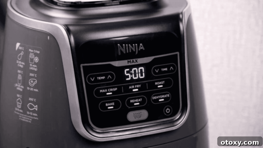 Crispy Chicken Delights 13 A digital air fryer display showing a temperature of 360°F (180°C), indicating it's preheating.