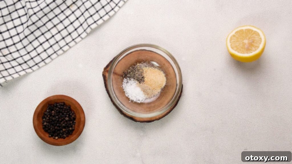 Crispy Air-Fried Tilapia with Zesty Garlic Butter 6 salt, ground white pepper, garlic and ground black pepper in small glass bowl