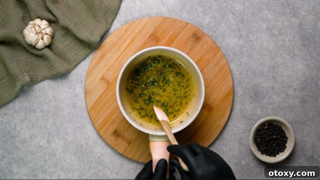 Melted butter with parsley and white pepper in pan