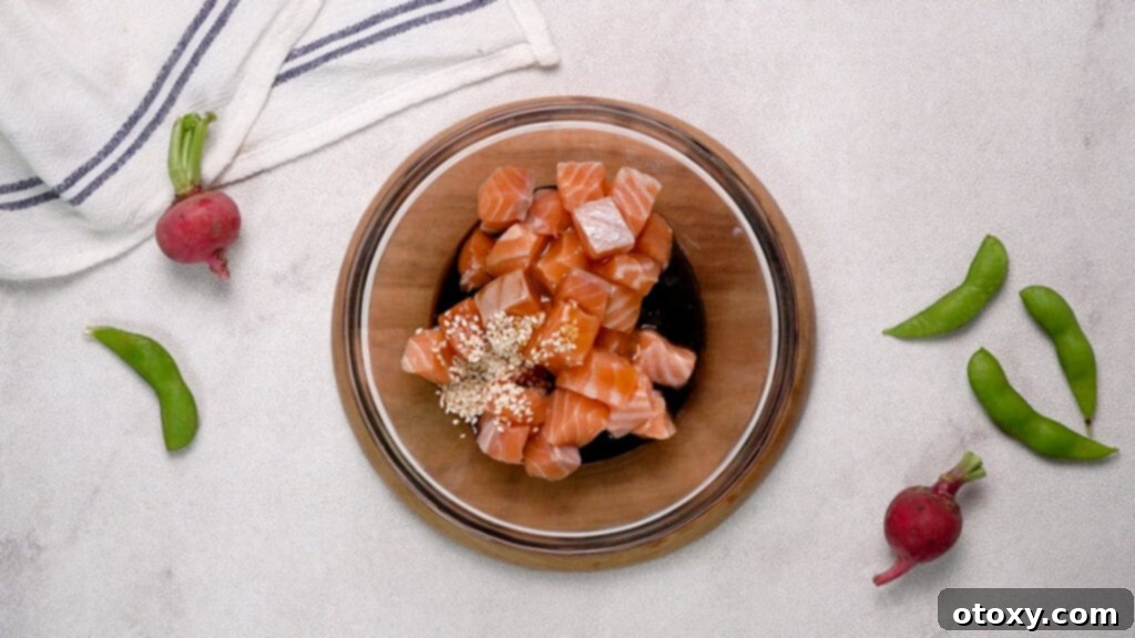 salmon and other ingredients in the bowl