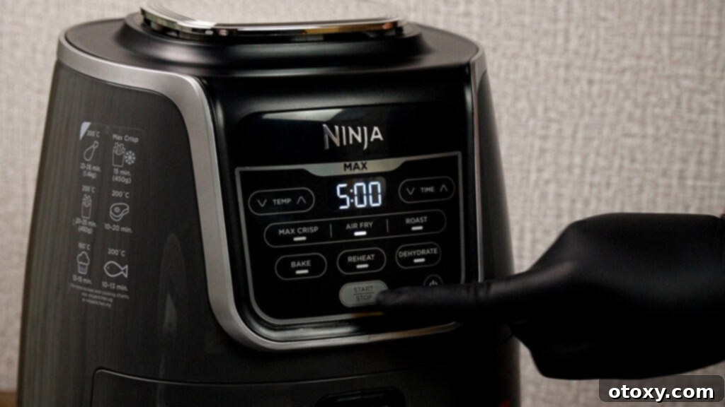 Air Fried Ground Beef Made Simple 5 Air fryer preheating with digital display