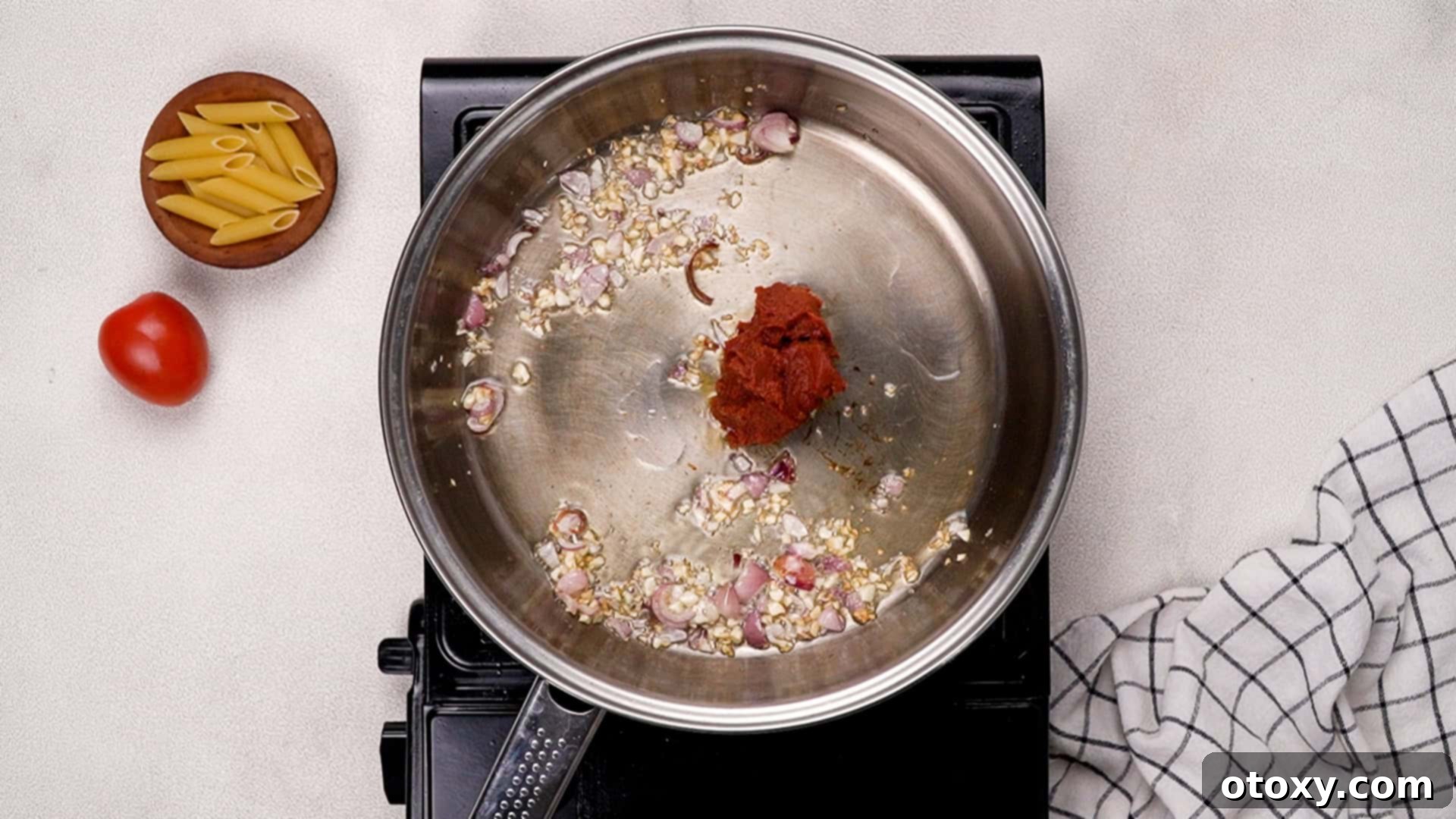 Tomato paste in pan.