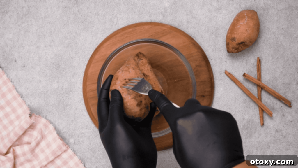 Pricking Sweet Potato with a Fork