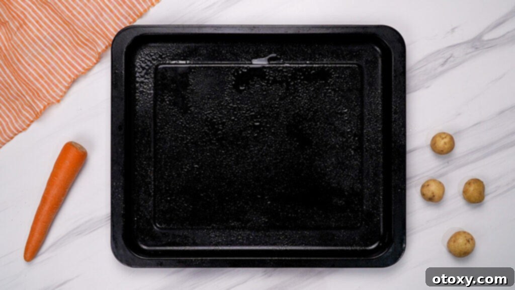 Herb Roasted Potatoes and Carrots 5 Baking sheet prepared for roasting vegetables