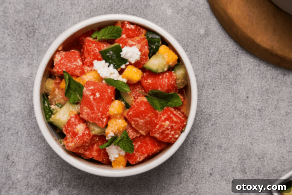 Watermelon Feta Summer Bliss 12 A bowl of freshly made watermelon feta salad, ready for serving or storage.