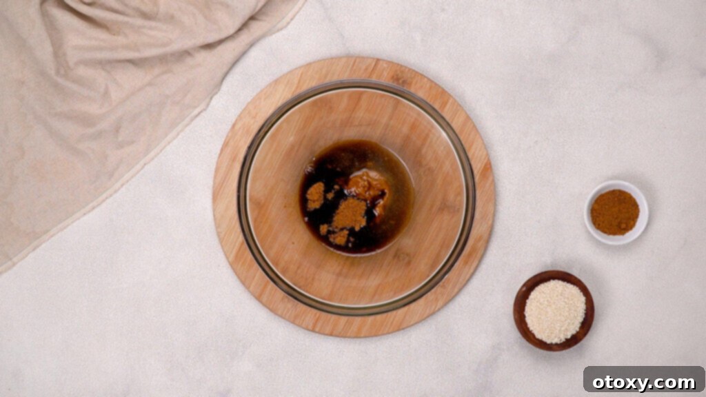 Ingredients for miso salmon marinade being whisked in a bowl