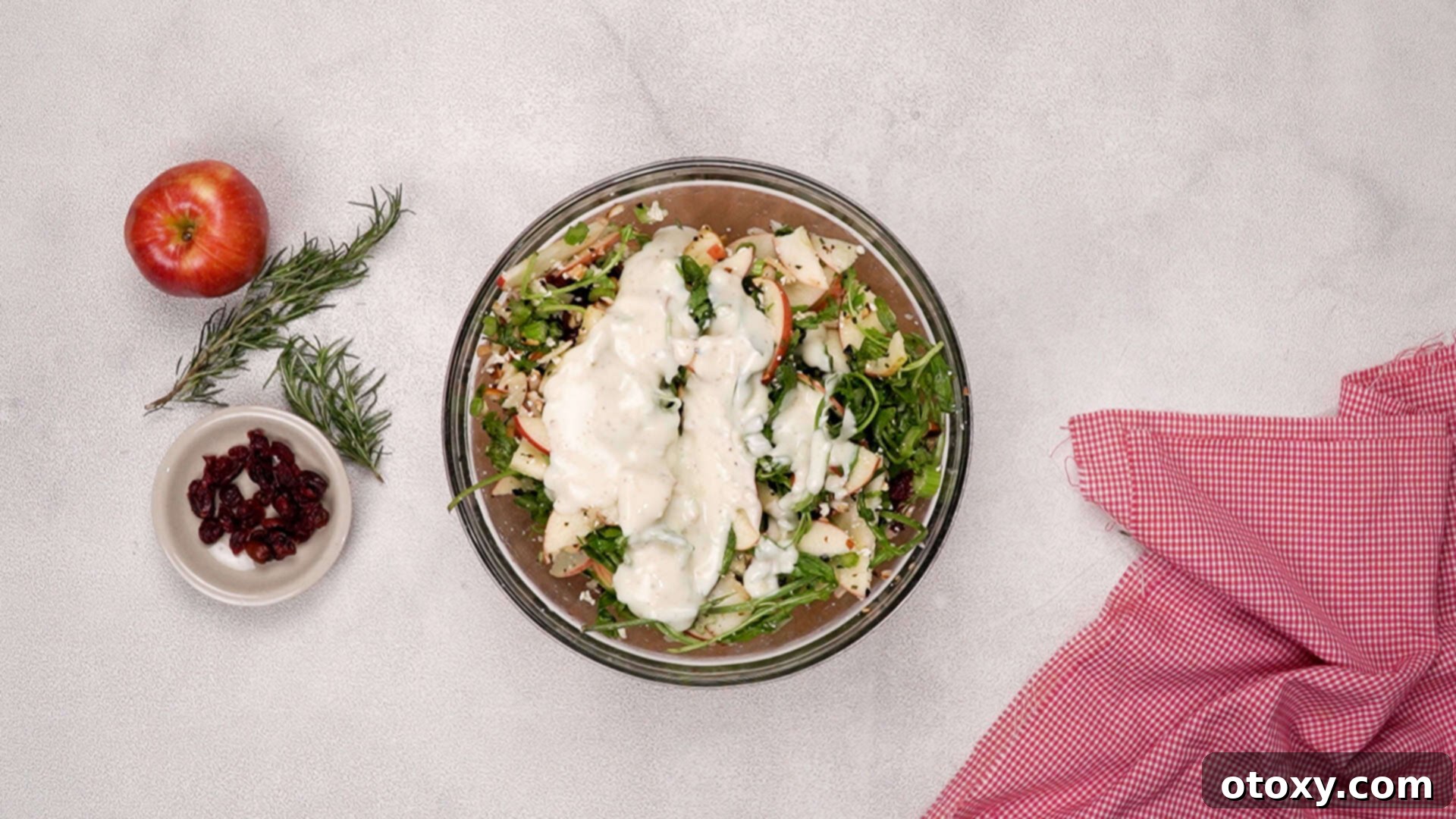 Orchard Fresh Apple Salad 17 Pouring dressing over apple salad