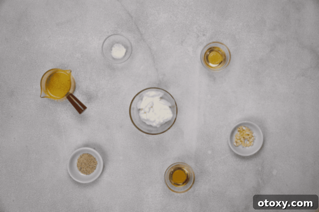 Orchard Fresh Apple Salad 4 Ingredients for the apple salad dressing, including yogurt, olive oil, and honey