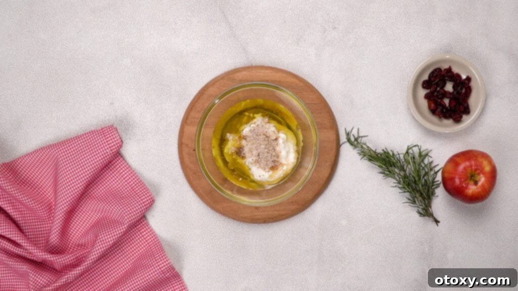 Orchard Fresh Apple Salad 5 Whisking the creamy dressing ingredients in a bowl