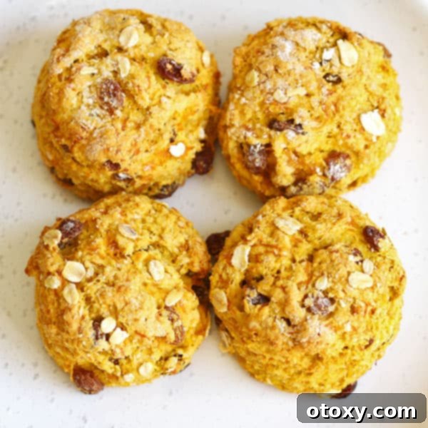 four healthy pumpkin scones on a cooling rack