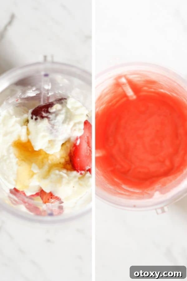 A close-up shot of the vibrant ingredients for strawberry pineapple popsicles being blended together in a high-speed blender cup, highlighting the smooth, creamy consistency of the mixture.