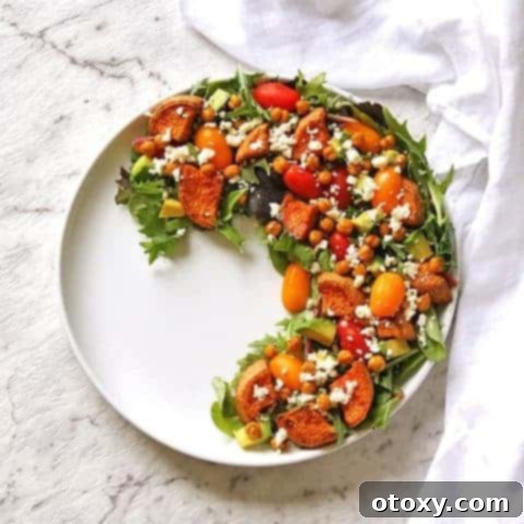 Vibrant Sweet Potato Chickpea and Feta Salad 3 Sweet Potato, Chickpea and Feta Salad with roasted vegetables and fresh greens.