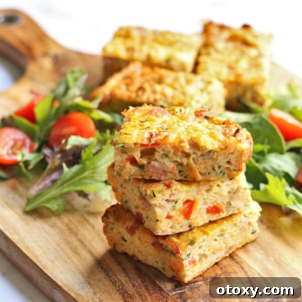 Delicious Zucchini and Bacon Slice, golden brown and freshly baked, ready to be served for breakfast, lunch, or dinner.