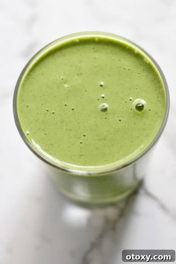 Tropical Kale Power Smoothie 4 Kale Pineapple Smoothie in a small glass