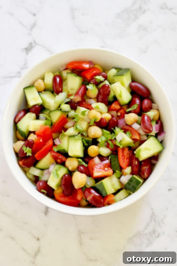 Zesty Two-Bean Power Salad 2 middle eastern bean salad in a white bowl