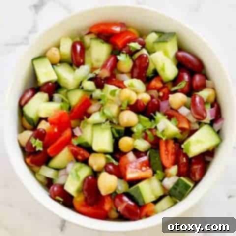 Zesty Two-Bean Power Salad 5 middle eastern bean salad in a white bowl