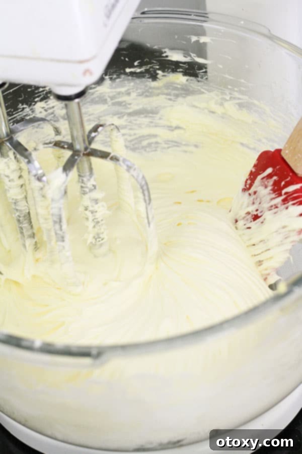 cream cheese frosting in a glass bowl.