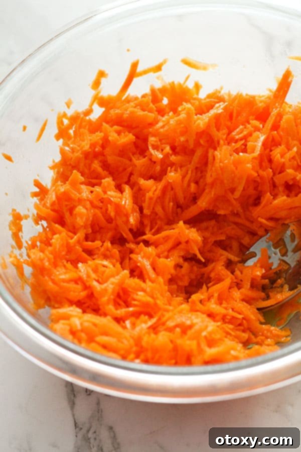 shredded carrots in a bowl.