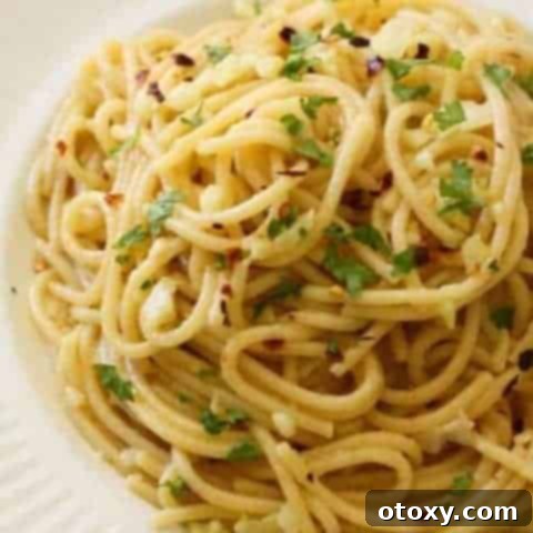 Classic Garlic and Olive Oil Spaghetti 10 Spaghetti with Garlic and Oil on a white plate