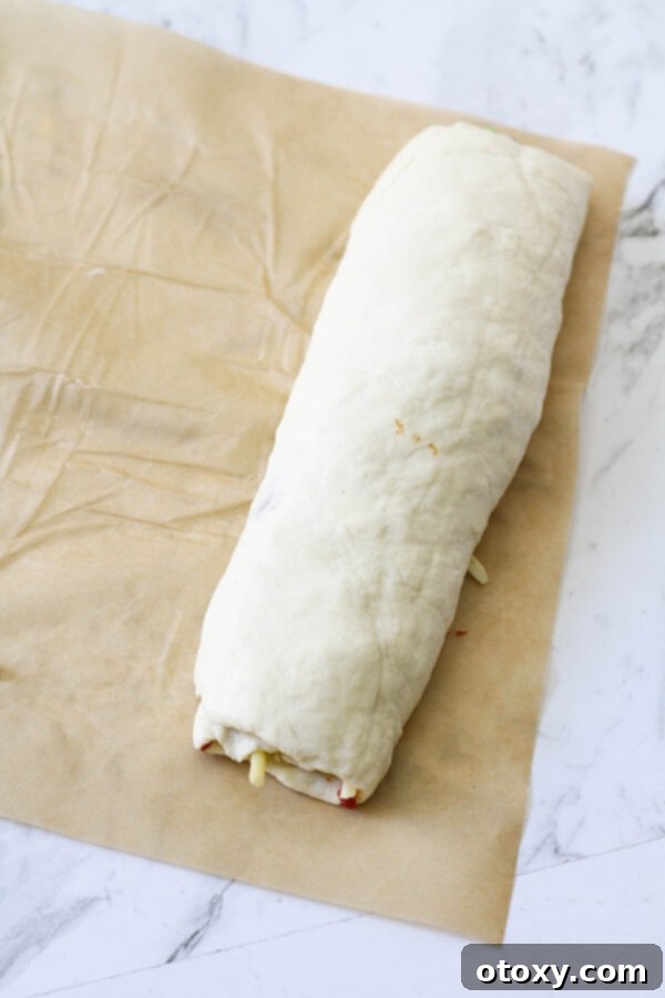 Pizza Pinwheels 8 Dough rolled into a log.