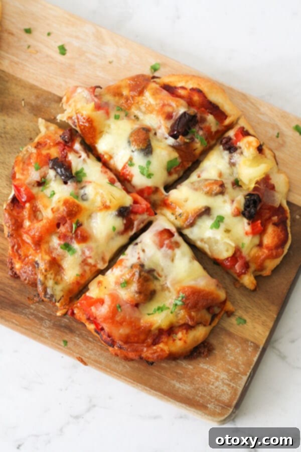 Delicious homemade supreme pizza on a wooden cutting board, topped with pepperoni, ham, vegetables, and melted mozzarella.