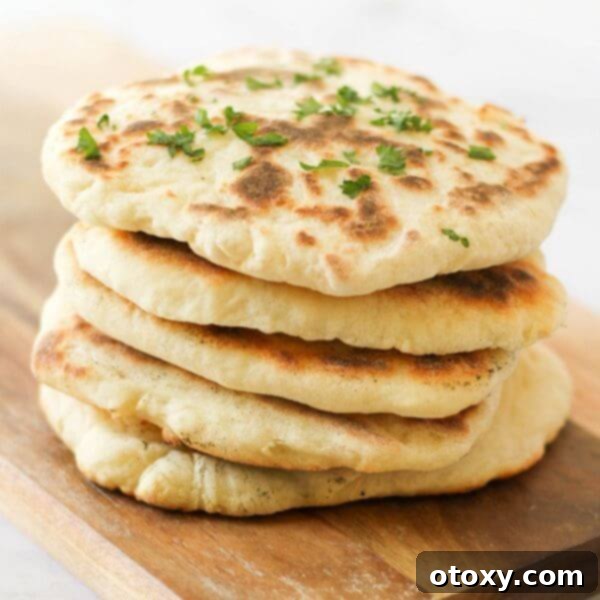 Light and fluffy yogurt flatbreads, perfect for scooping up dips or accompanying curries and stews.